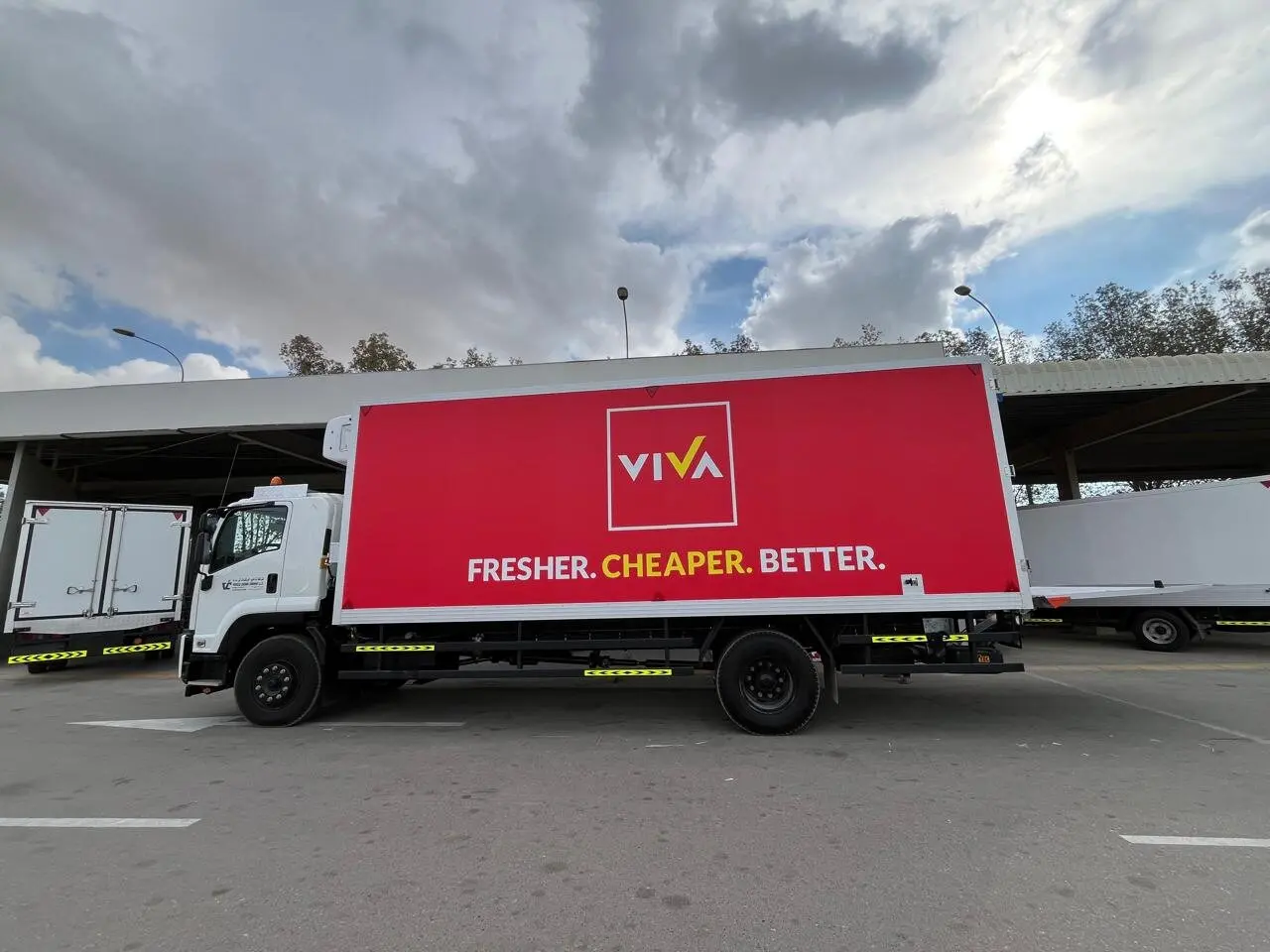 VIVA delivery truck with red fleet graphics