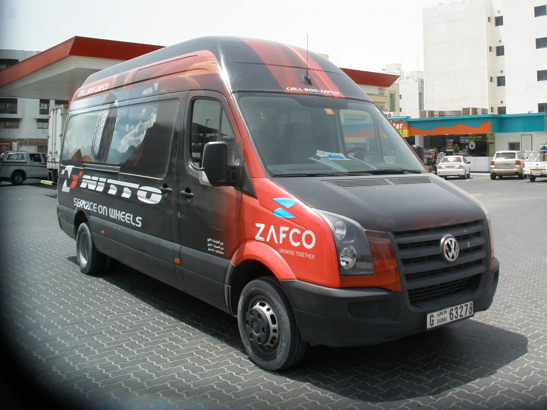 ZAFCO commercial van with red and black fleet graphics
