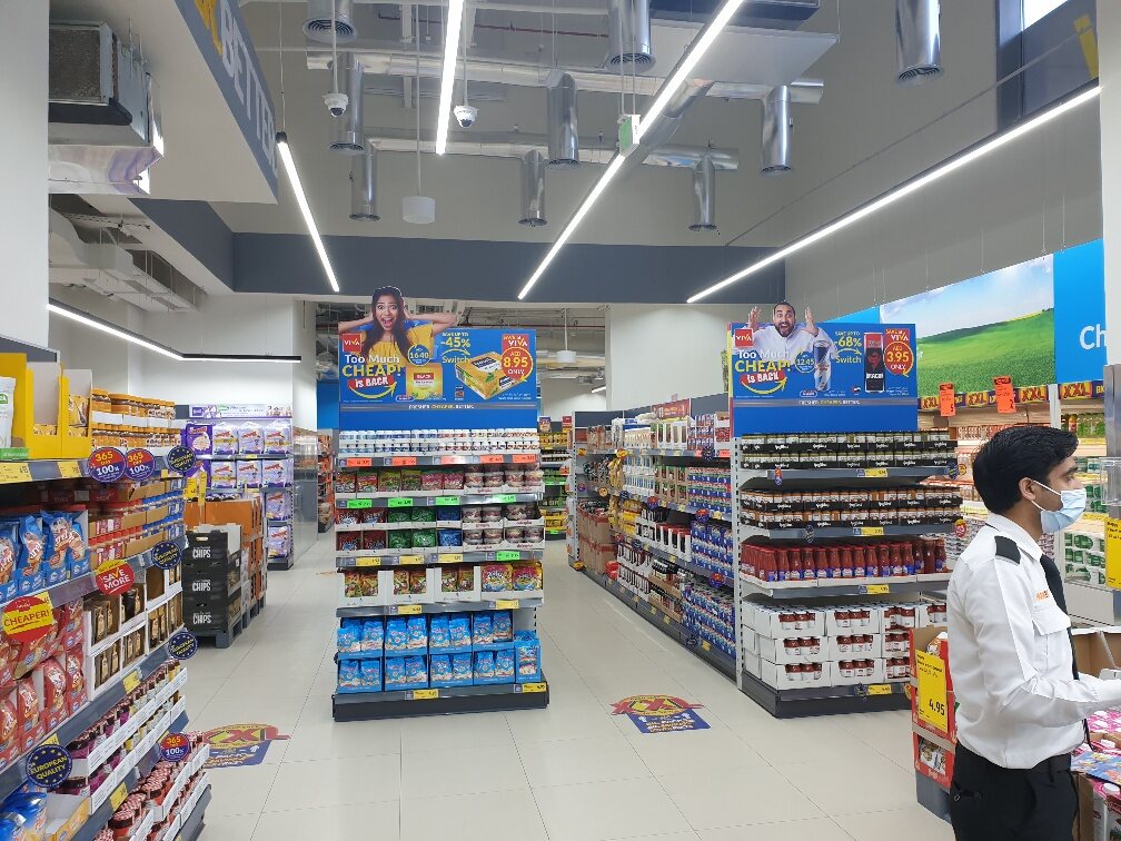 VIVA supermarket interior with coordinated aisle graphics